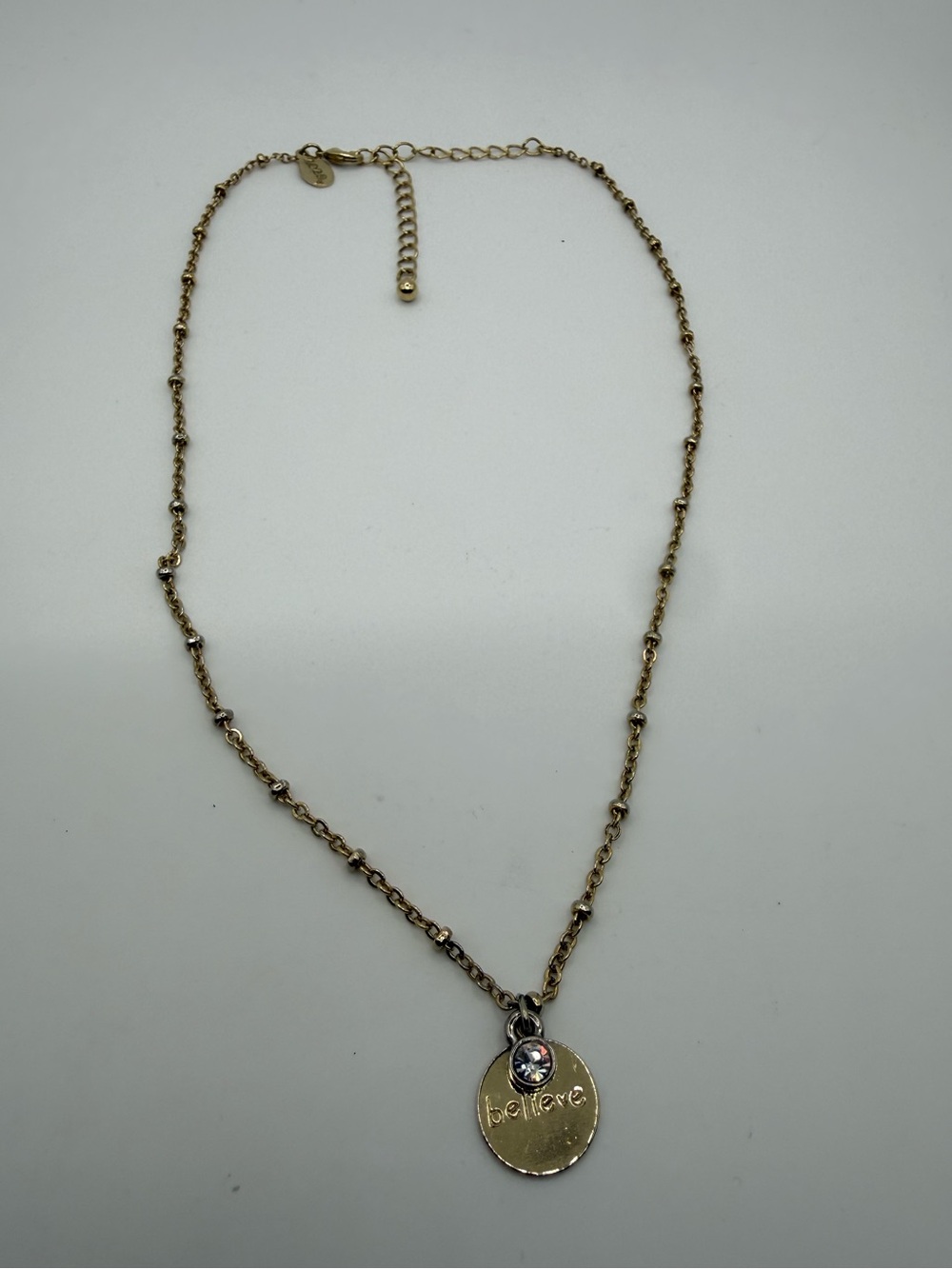 2028 Gold Tone Believe Crystal Pendant Necklace 19”